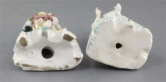 Two Derby Pale Family seated figures of a gentleman and a lady, c.1756-8, h. 13.3cm and 13.8cm, restorations